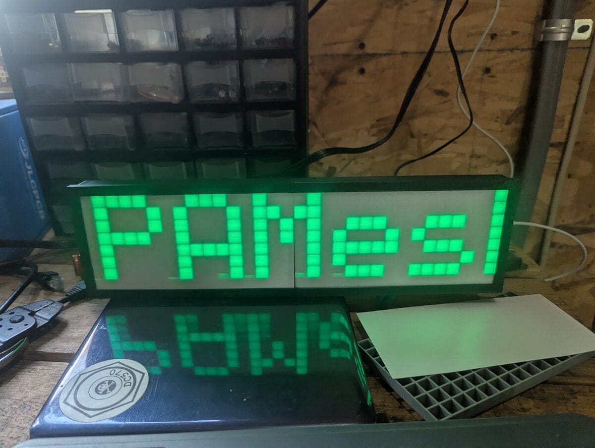 NEPAMesh LED matrix display scrolling green text