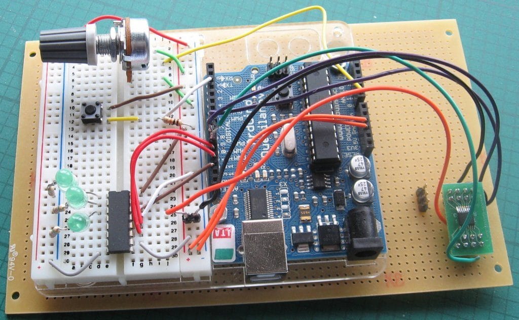 Soldered components on a perfboard showing hookup wire and discrete parts