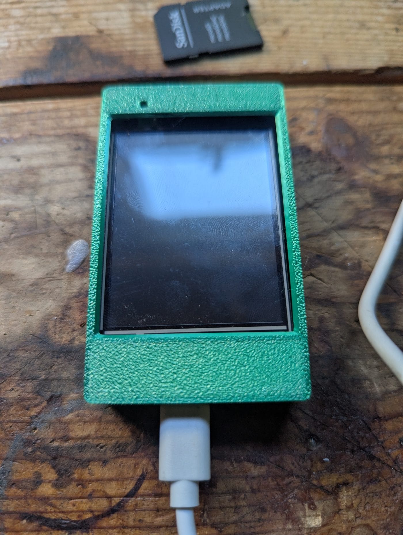 AITRIP ESP32-2432S024R CYD display in 3D-printed green enclosure